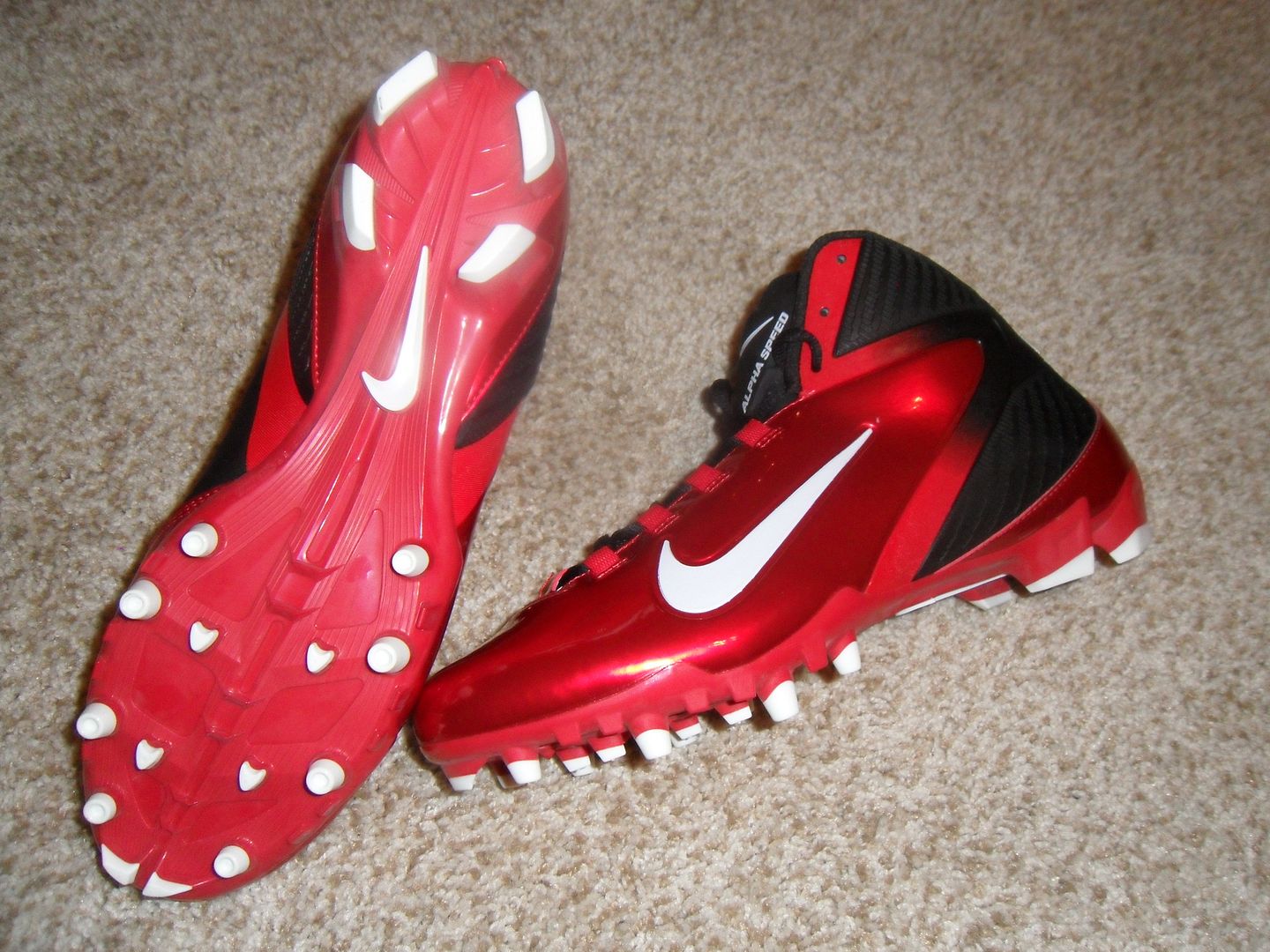 red black and white football cleats